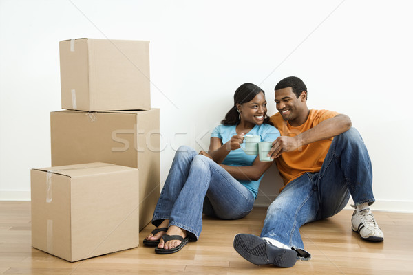 Portrait of couple with boxes. Stock photo © iofoto