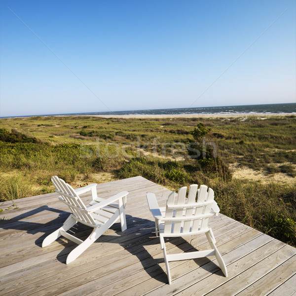Deck chairs on beach.  Stock photo © iofoto