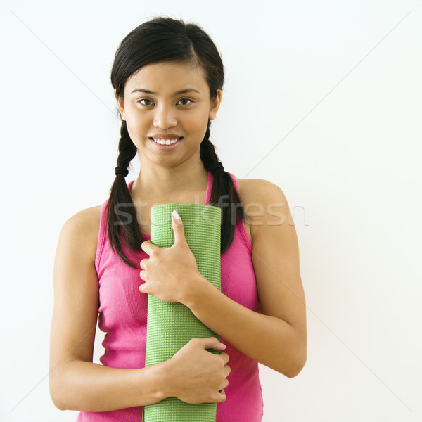 Vrouw yogamat portret glimlachend jonge asian Stockfoto © iofoto