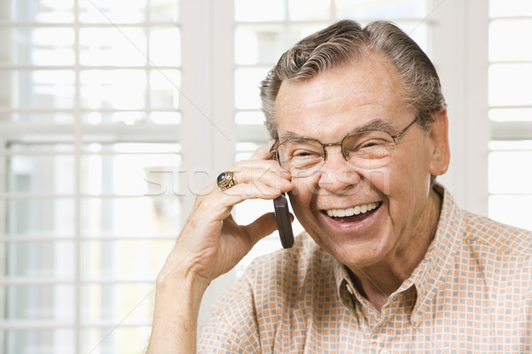 Mature man on cellphone. Stock photo © iofoto