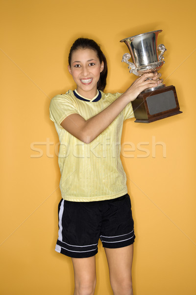 Girl holding trophy. Stock photo © iofoto