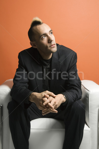 Man with mohawk wearing suit. Stock photo © iofoto