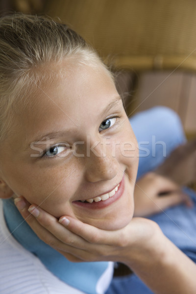 Portret uśmiechnięty dziewczyna podbródek strony Zdjęcia stock © iofoto