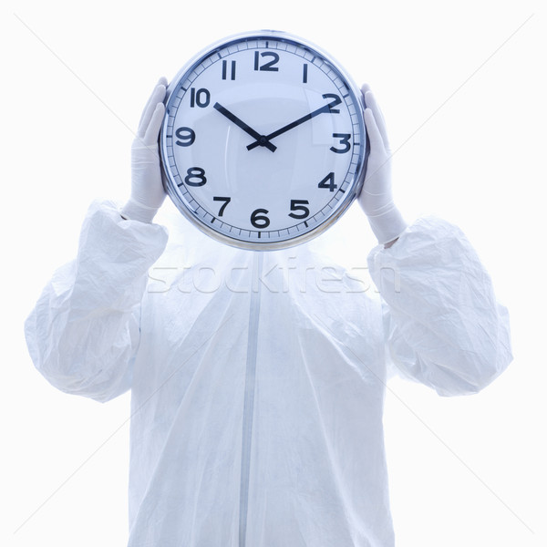 Mann Uhr Anzug halten Zifferblatt Stock foto © iofoto
