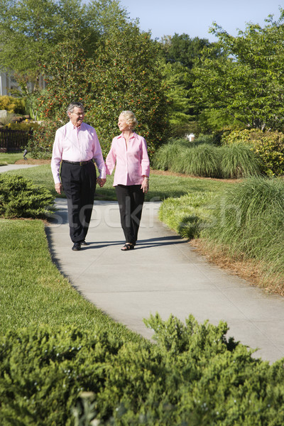 Mature couple walking. Stock photo © iofoto