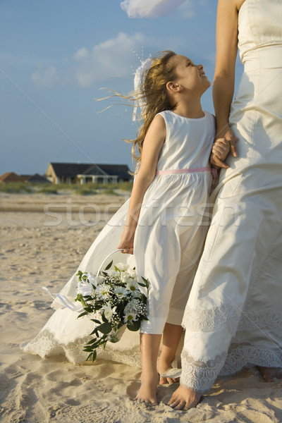 Stock photo: Bride and Flower Girl on Beach