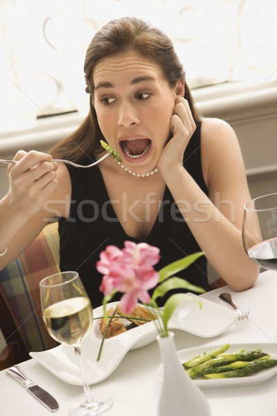 Nő eszik felnőtt kaukázusi készít eltúlzott Stock fotó © iofoto