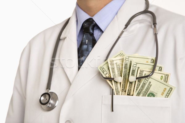 Stock photo: Doctor with cash.
