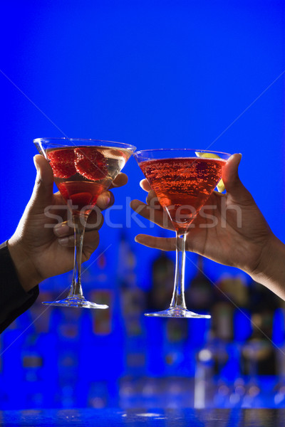 Cócteles martini gafas manos brindis Foto stock © iofoto