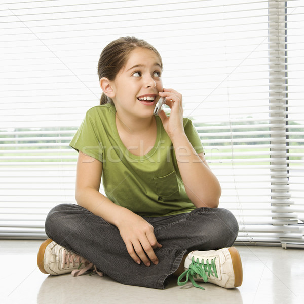 Girl on cell phone. Stock photo © iofoto