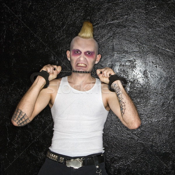 Punk bilincs kaukázusi férfi húz lánc Stock fotó © iofoto