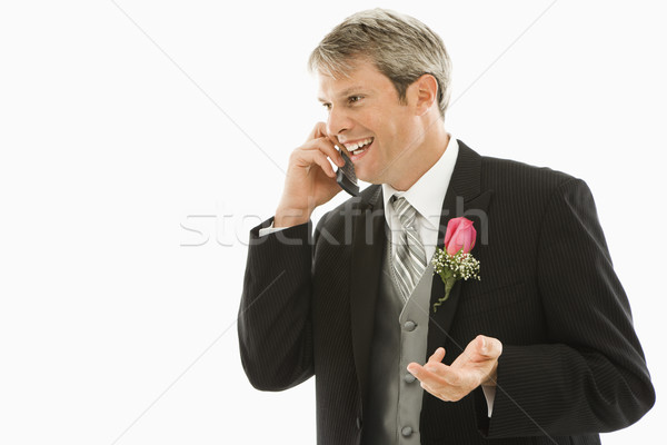 Vőlegény beszél mobiltelefon kaukázusi telefon házasság Stock fotó © iofoto