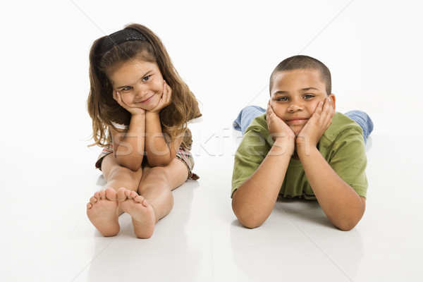 Retrato hermano hermana hispanos sesión sonriendo Foto stock © iofoto