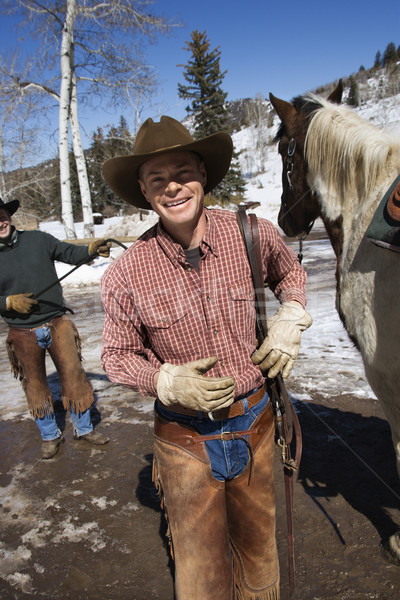 Uomini piedi cavallo sorridere uomo cappello da cowboy Foto d'archivio © iofoto
