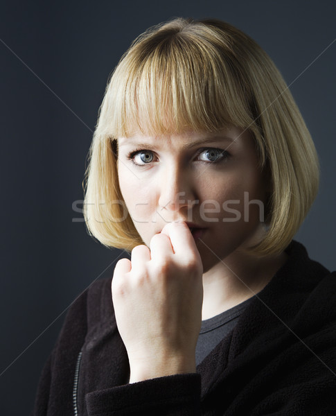 Pensive young woman Stock photo © iofoto