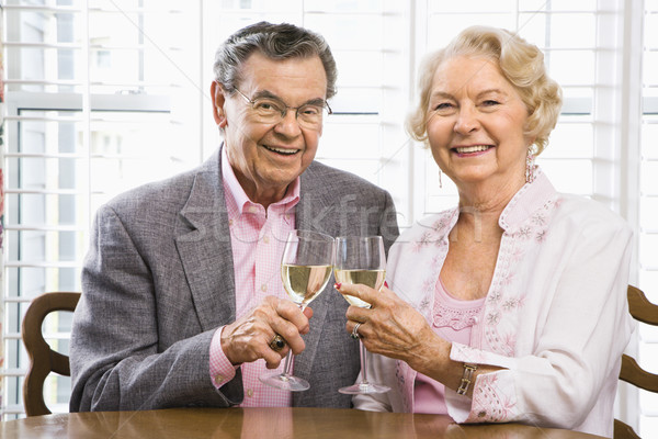 Mature couple with wine. Stock photo © iofoto
