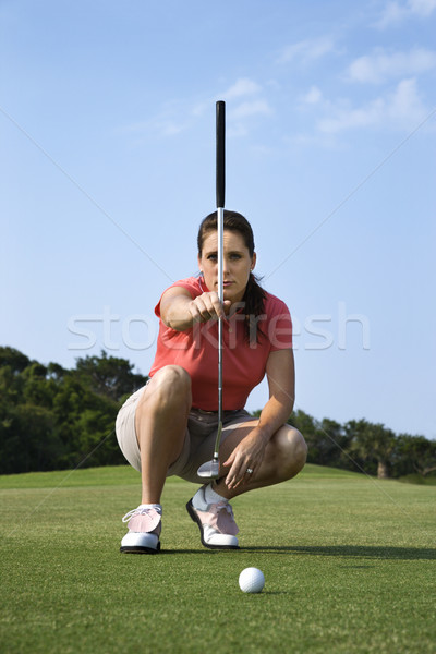 Female Golfer Concentrating Stock photo © iofoto