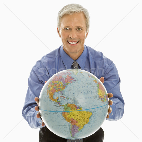 Man gesturing with globe. Stock photo © iofoto