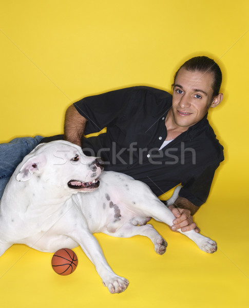 Man with white dog. Stock photo © iofoto