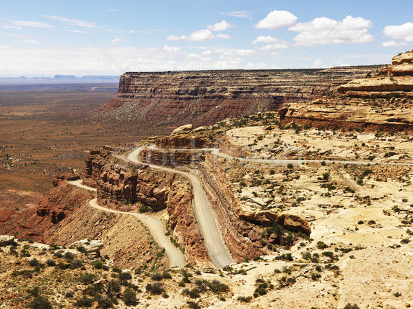 Winding Road on Rugged Desert Rock Formation Stock photo © iofoto