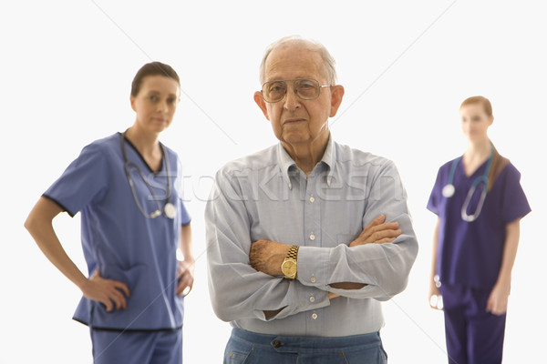 Man with medical workers. Stock photo © iofoto