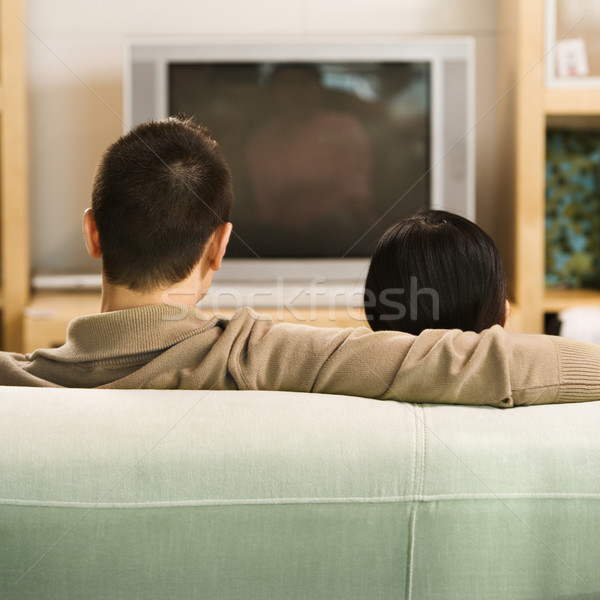 Couple watching TV. Stock photo © iofoto