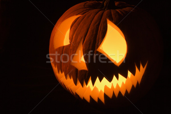 Carved pumpkin. Stock photo © iofoto