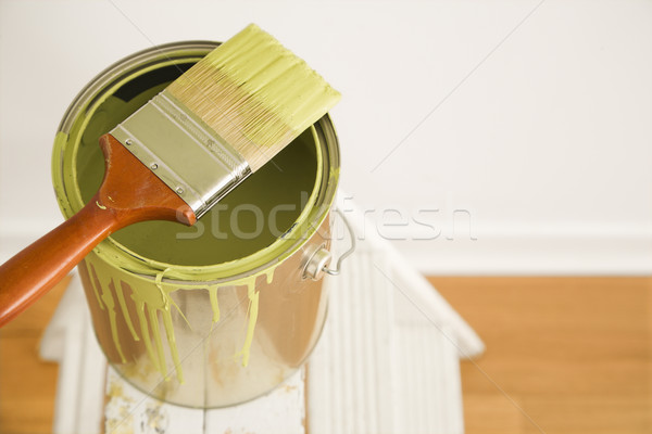 Paintbrush and can on ladder. Stock photo © iofoto