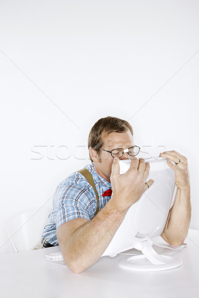 Man hugging computer. Stock photo © iofoto