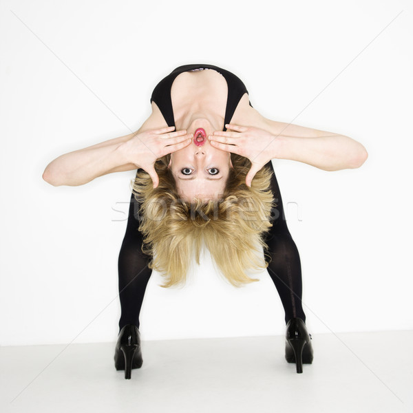 Woman bending over backwards. Stock photo © iofoto