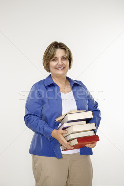 Woman holding books. Stock photo © iofoto