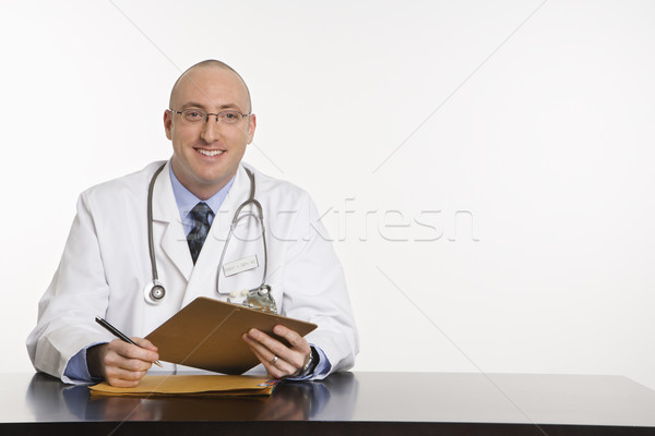 Masculin caucazian medic adult şedinţei Imagine de stoc © iofoto