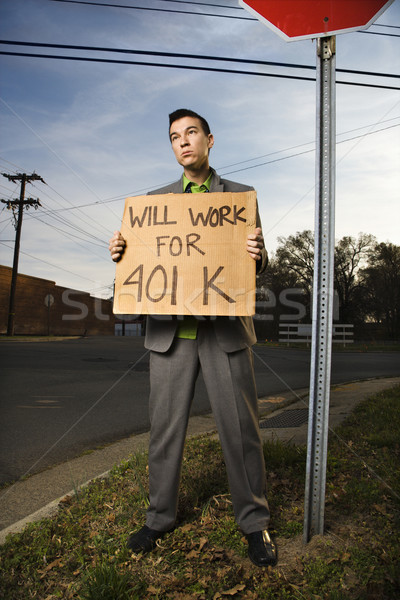 Fiatal üzletember tart nyugdíjalap felirat utca Stock fotó © iofoto