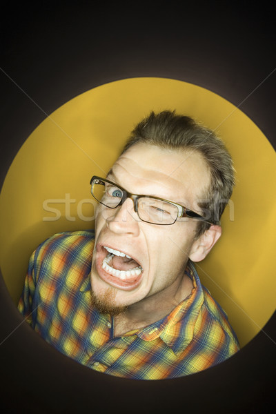 Man making funny face. Stock photo © iofoto