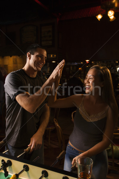 Couple giving high five. Stock photo © iofoto