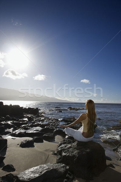 Woman meditating. Stock photo © iofoto