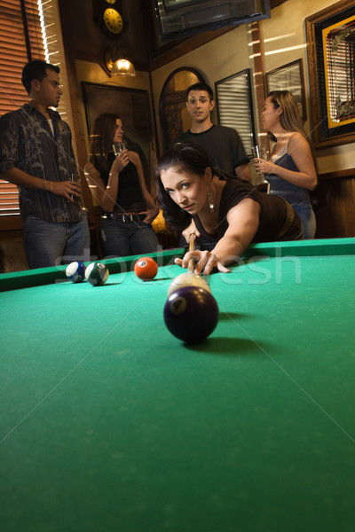 Woman shooting pool. Stock photo © iofoto