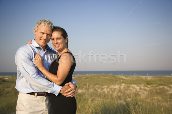 Portrait of Couple on Beach Stock photo © iofoto