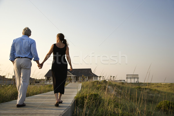 Couple marche main plage horizontal coup [[stock_photo]] © iofoto