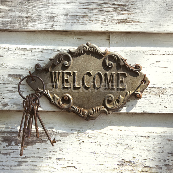 Bienvenida signo pared metal claves edad Foto stock © iofoto
