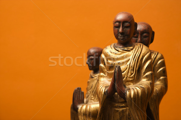 Meditating statues. Stock photo © iofoto