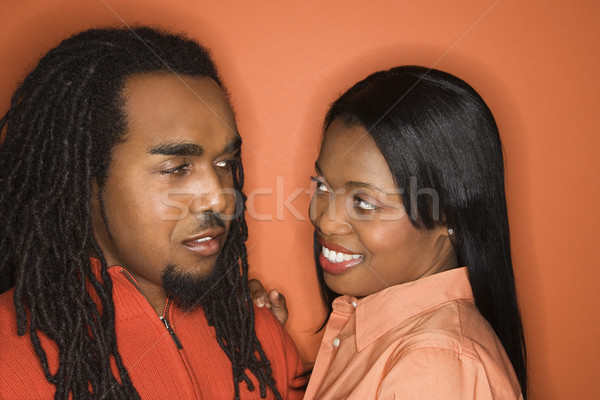 Woman smiling at man. Stock photo © iofoto