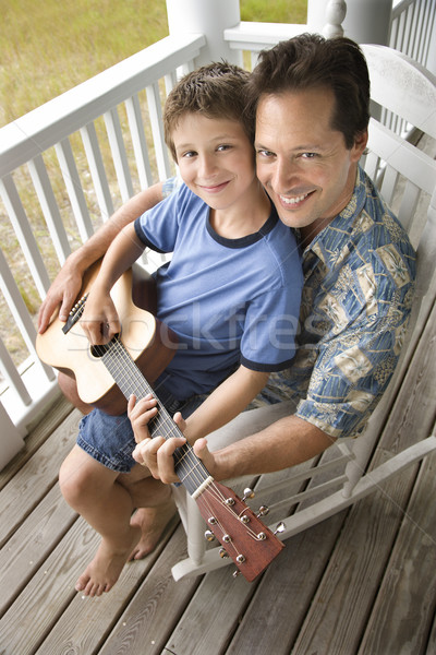 父から息子 ポーチ 演奏 ギター 少年 座って ストックフォト © iofoto