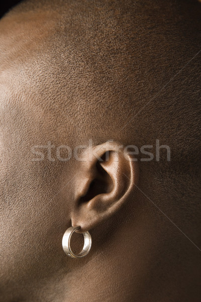 Oído pendiente vista lateral retrato hombre Foto stock © iofoto