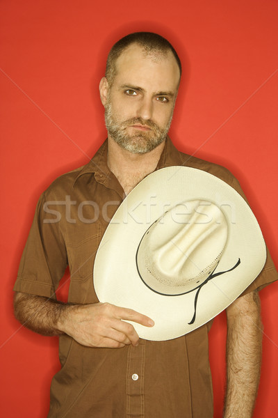 Férfi cowboykalap kaukázusi szakáll kopaszodó halánték tart Stock fotó © iofoto