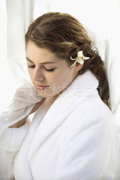 Stock photo: Woman with orchid.