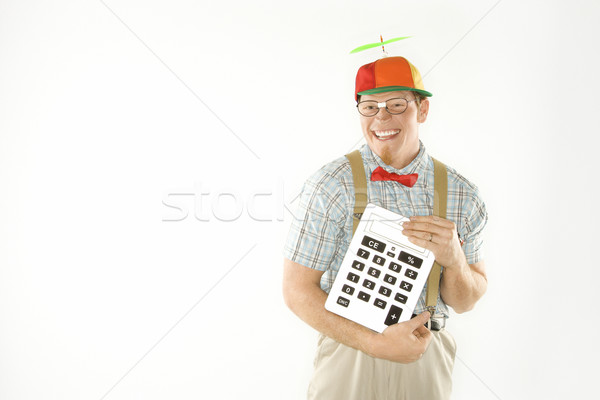 Nerd holding calculator. Stock photo © iofoto