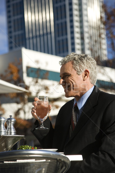 Businessman at outdoor cafe. Stock photo © iofoto