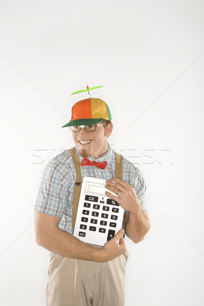 Dork holding calculator. Stock photo © iofoto