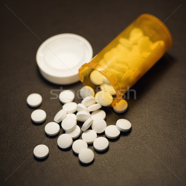 Fehér tabletták üveg nyitva gyógyszeres üveg ki Stock fotó © iofoto